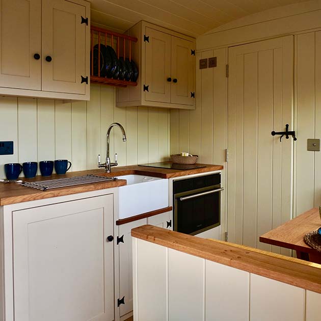 handmade wooden kitchen in wraxall vineyard shepherd's huts