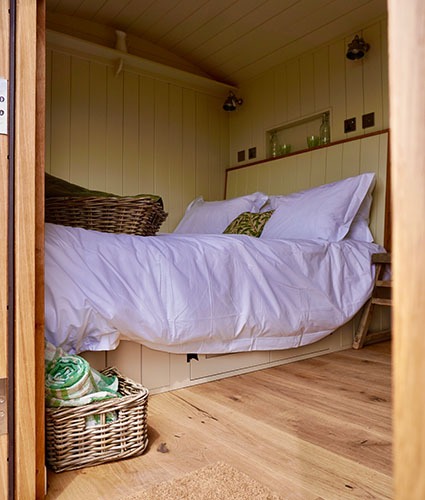 shepherd hut at wraxall vineyard luxury king bed