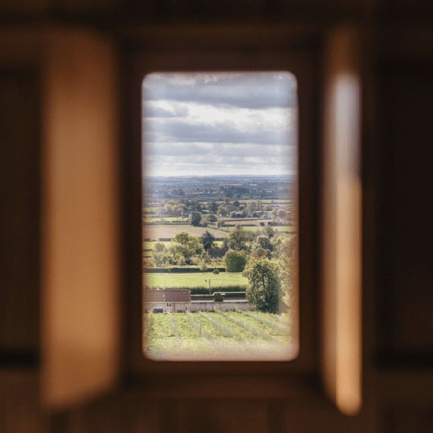 wow view from the shepherd's hut window across somerset